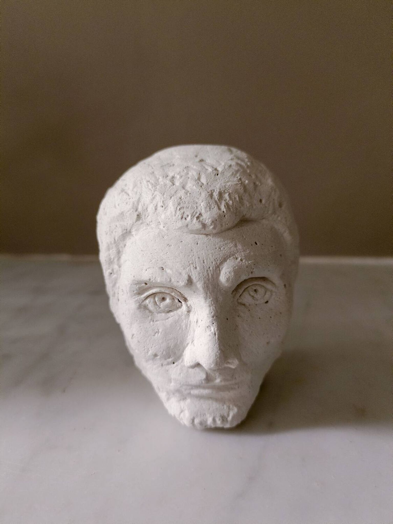Tête d'homme en plâtre