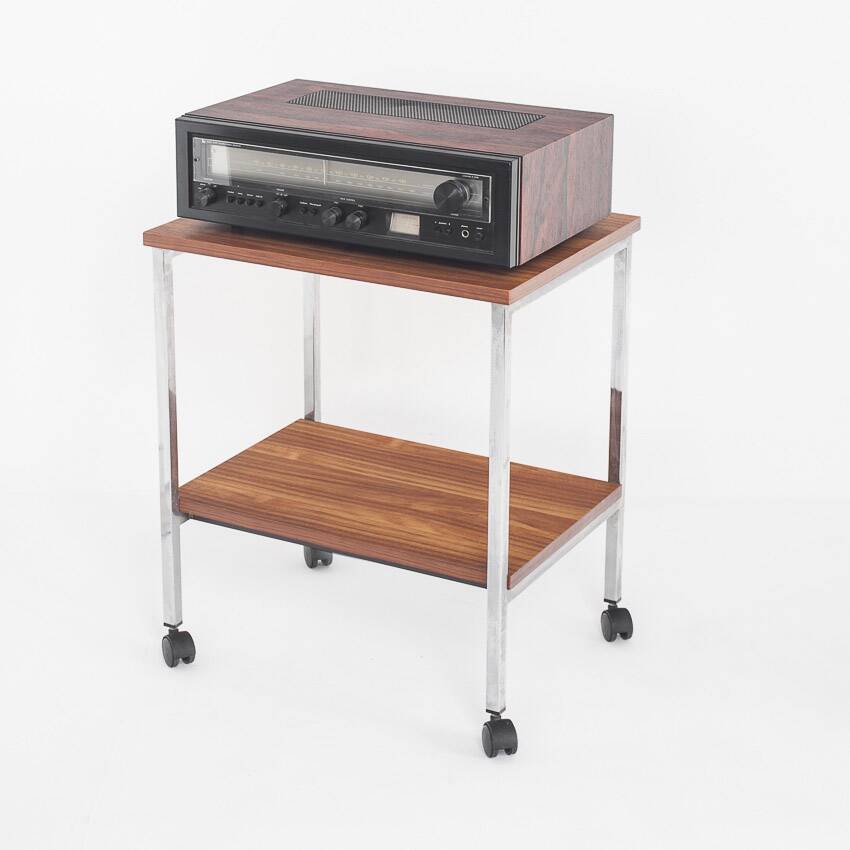 Vintage side table on wheels. Chrome-plated iron tube and wood. France, 1970s.
