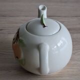 Slush teapot with embossed fruit decoration