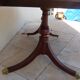 Mahogany top table inlaid with light wood nets and brass toes