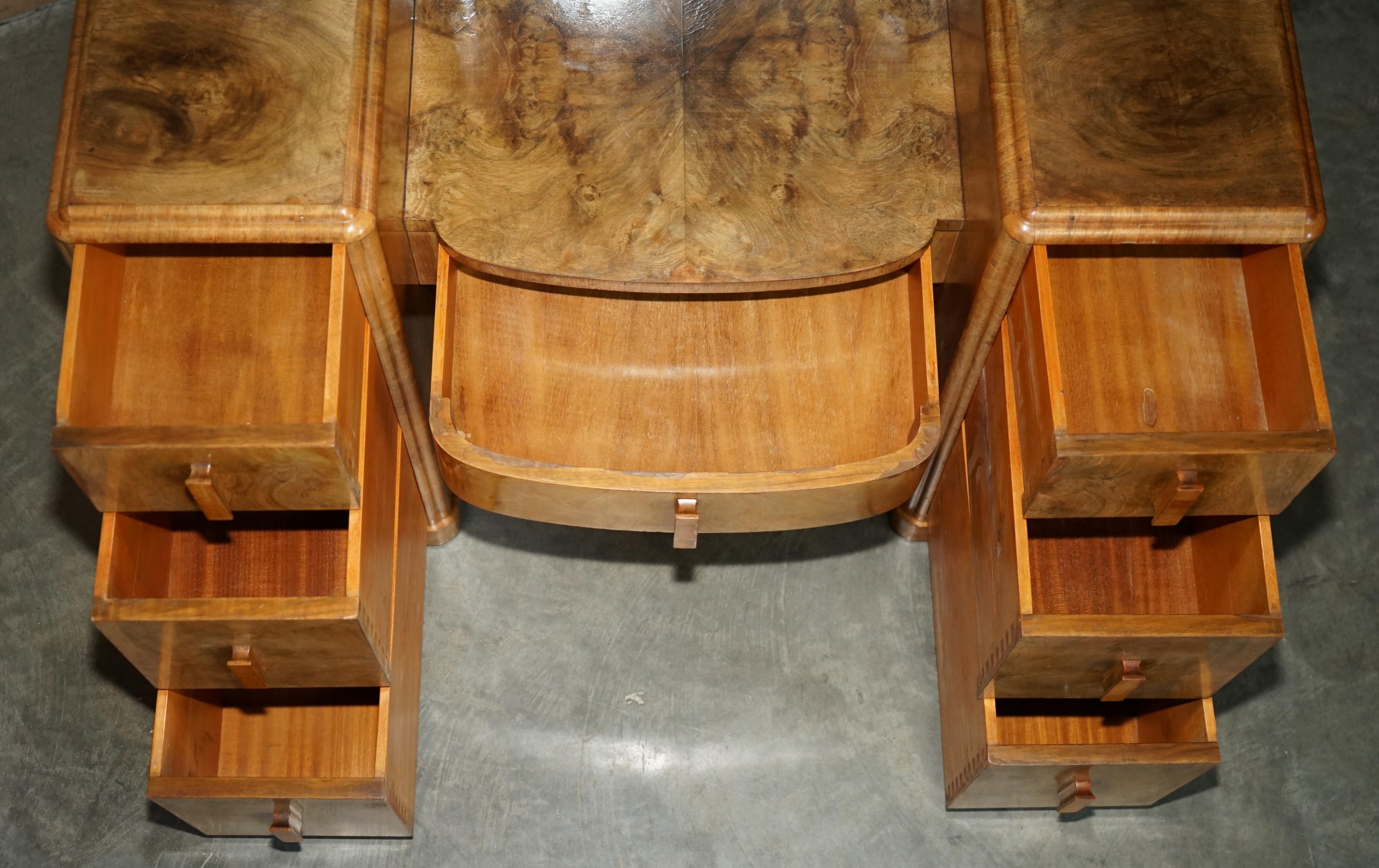 Art Deco dressing table in satin walnut with mirror, circa 1930.