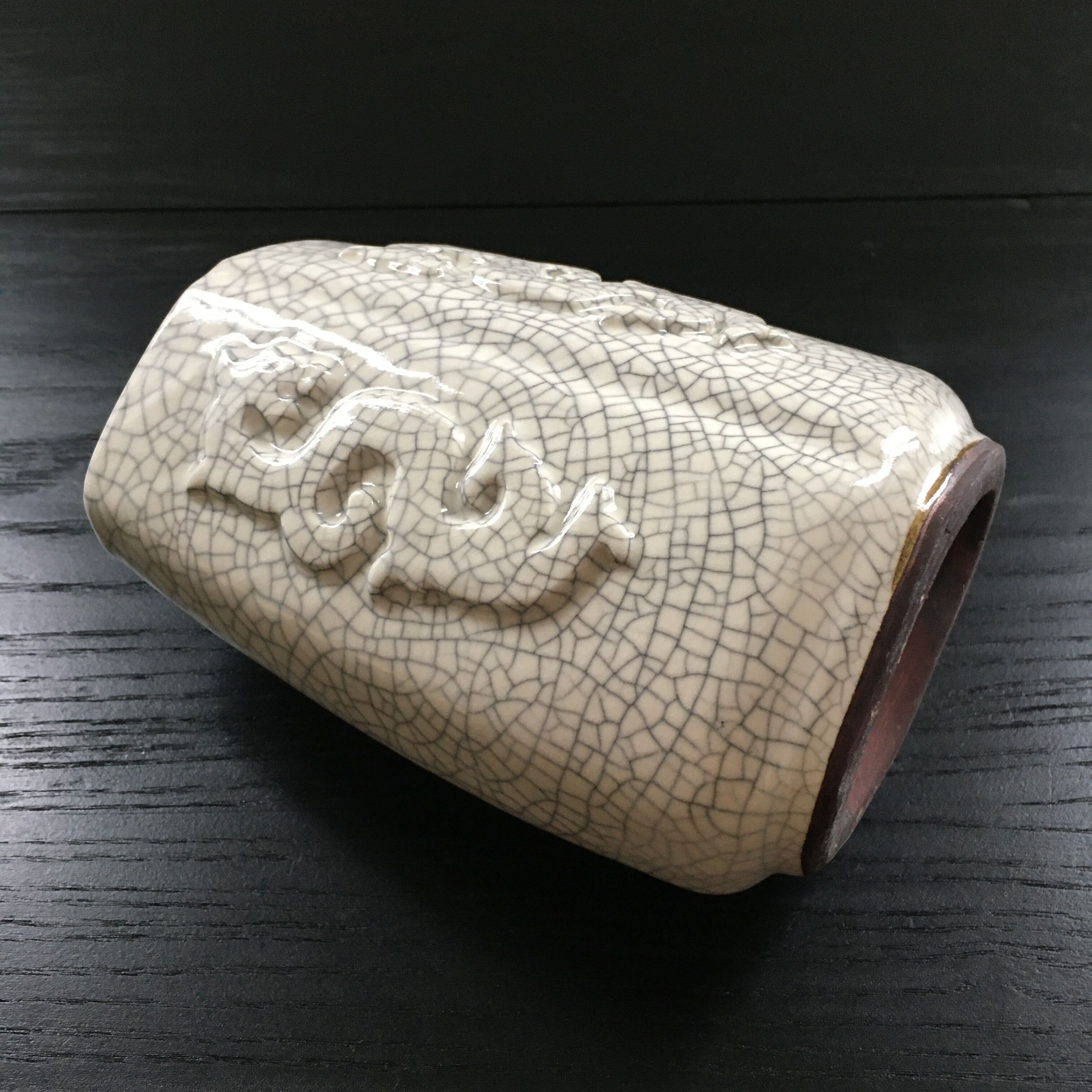 Raku vase with fish and seahorse decoration