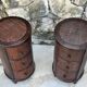 Pair of cylindrical bedside tables or drum bedside tables in exotic wood.