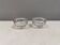 A set of iittala candle holders in clear transparent glass.