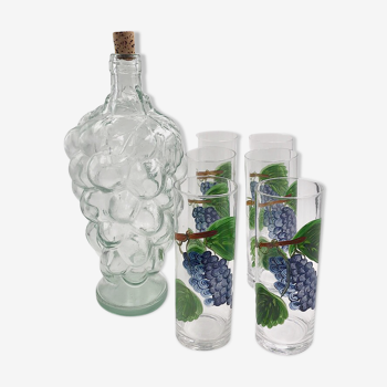 Bottle and vintage glasses grapes