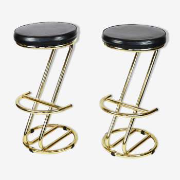 Pair of high brass stools