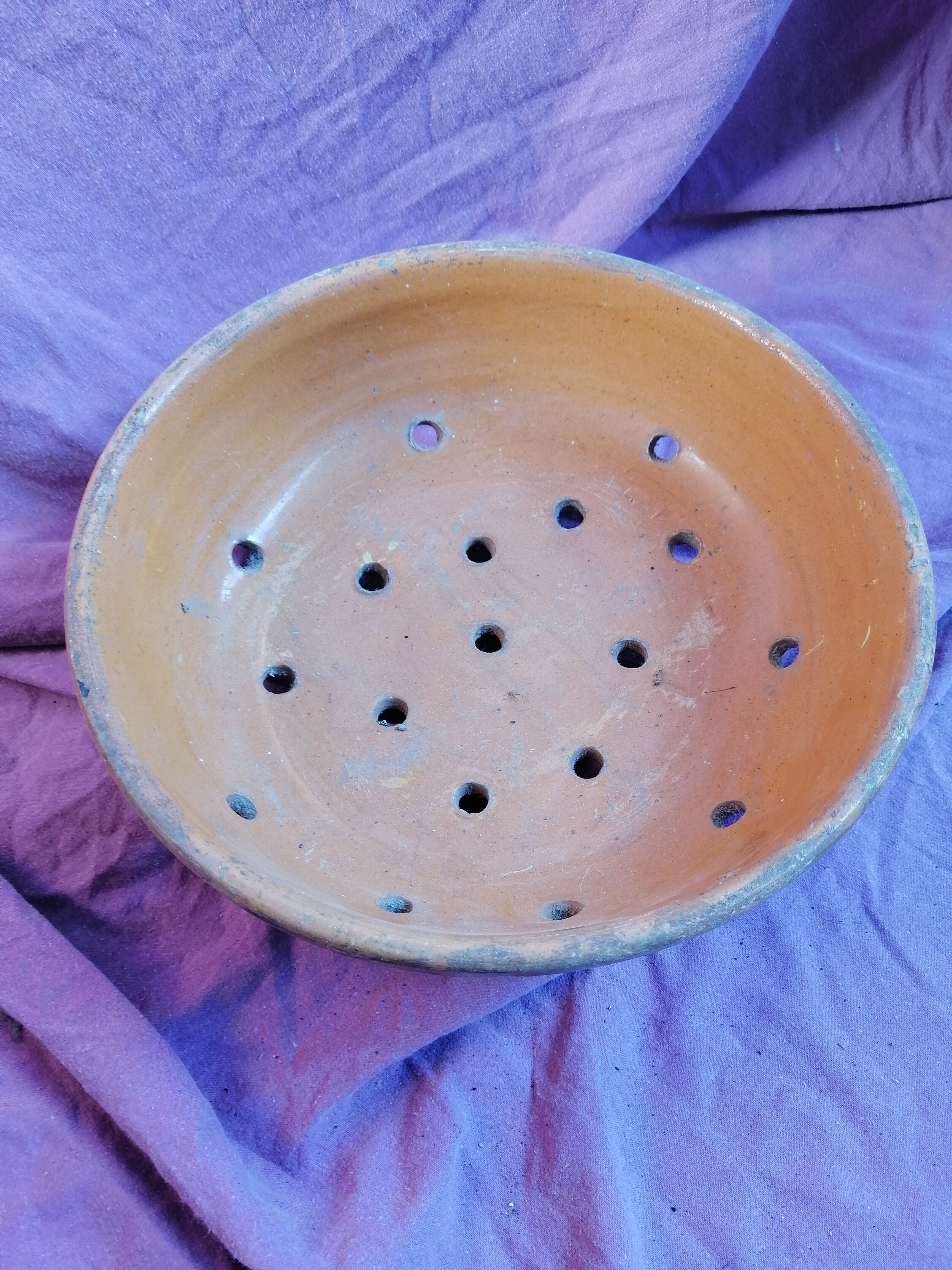 Old dish drainer in mud