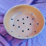 Old dish drainer in mud