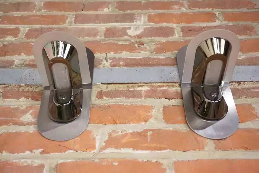 Pair of stainless steel and glass wall lights