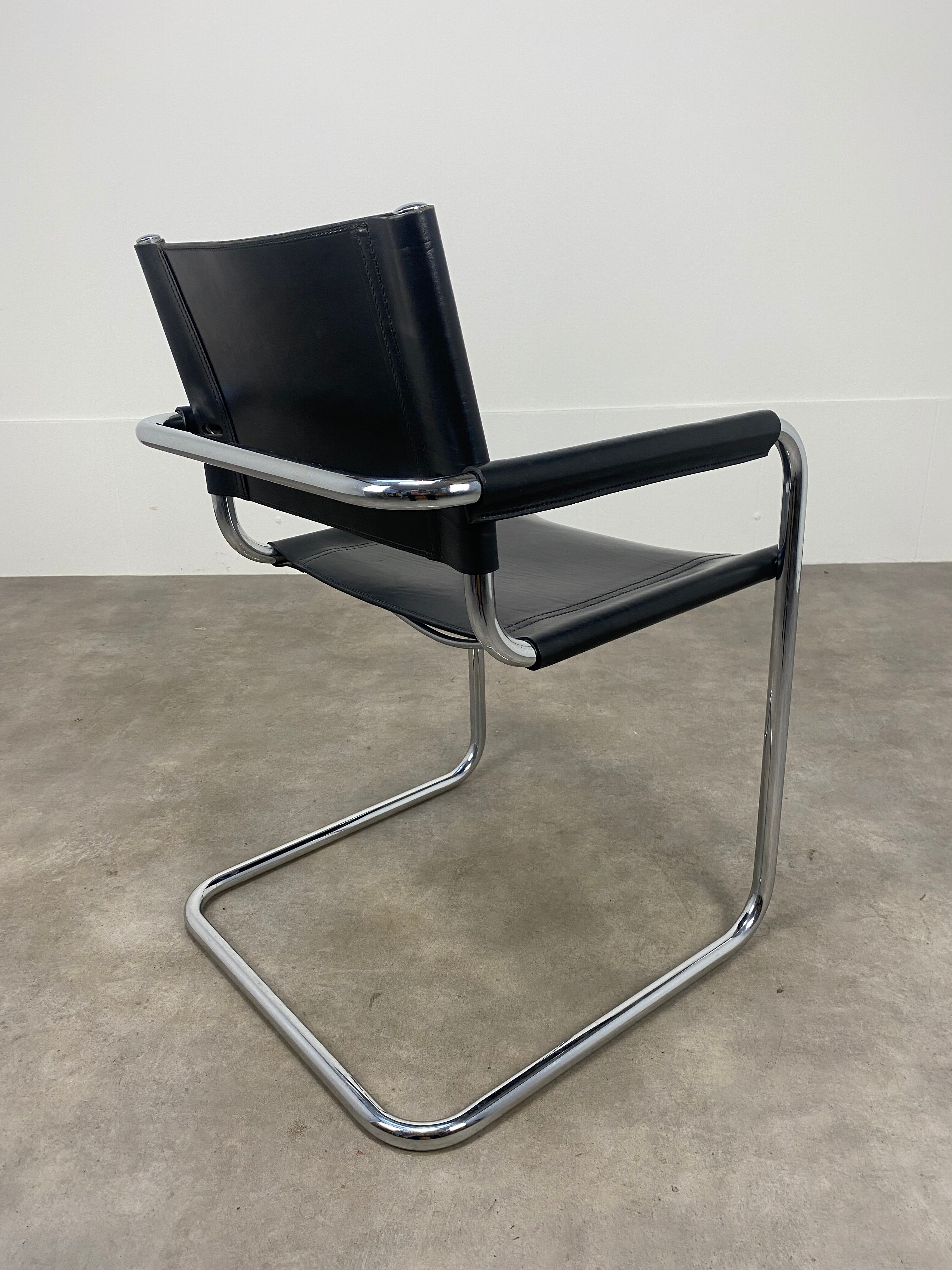 Black and chrome leather cantilever armchair