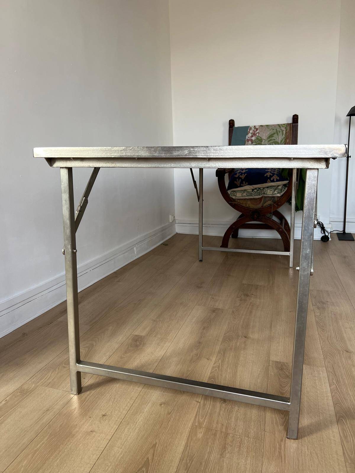 Folding industrial-style dining table