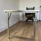 Folding industrial-style dining table