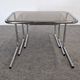 Nested tables with tubular chrome and smoked glass, France 1970.
