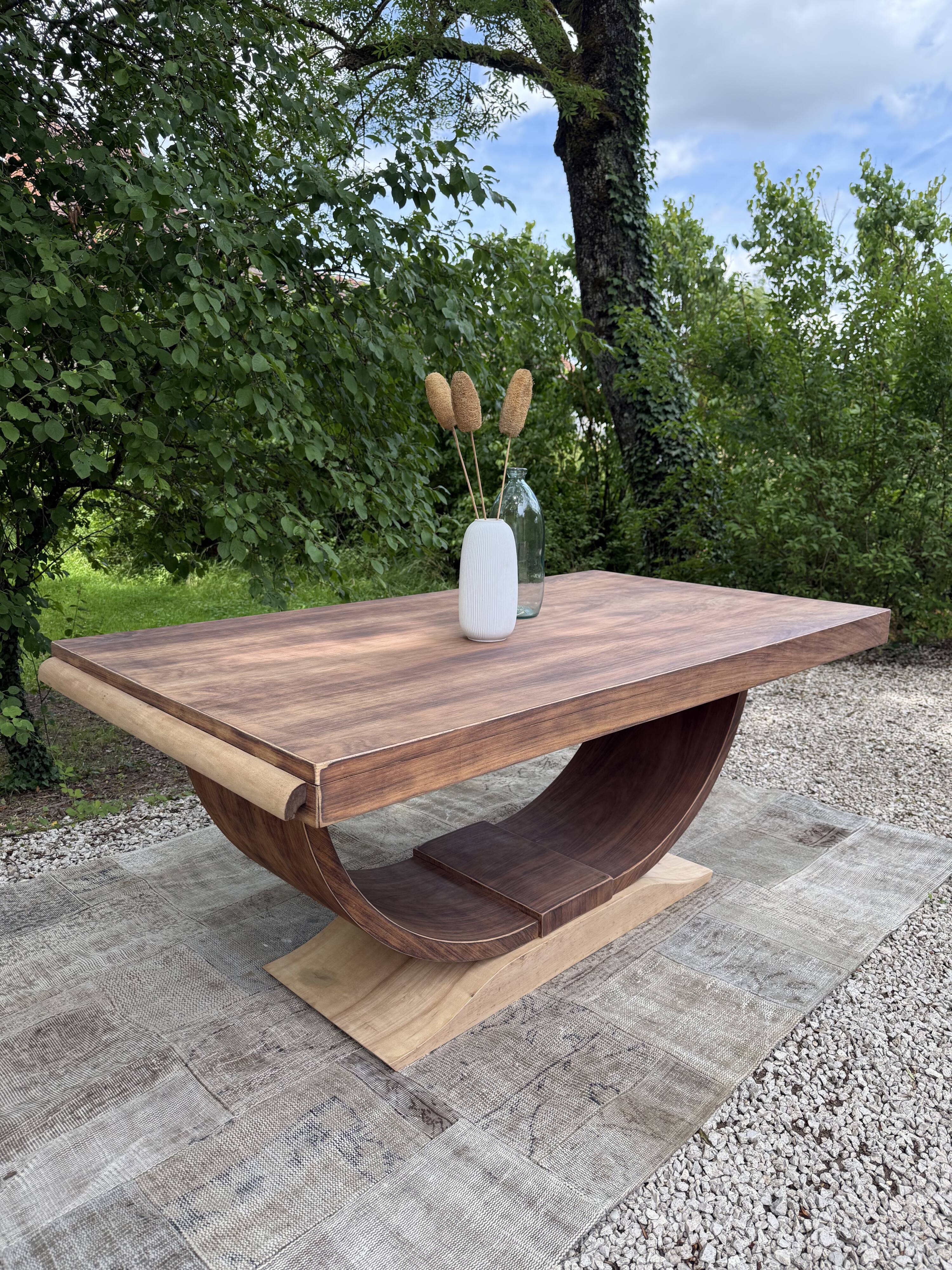 Renovated wooden table with extensions.