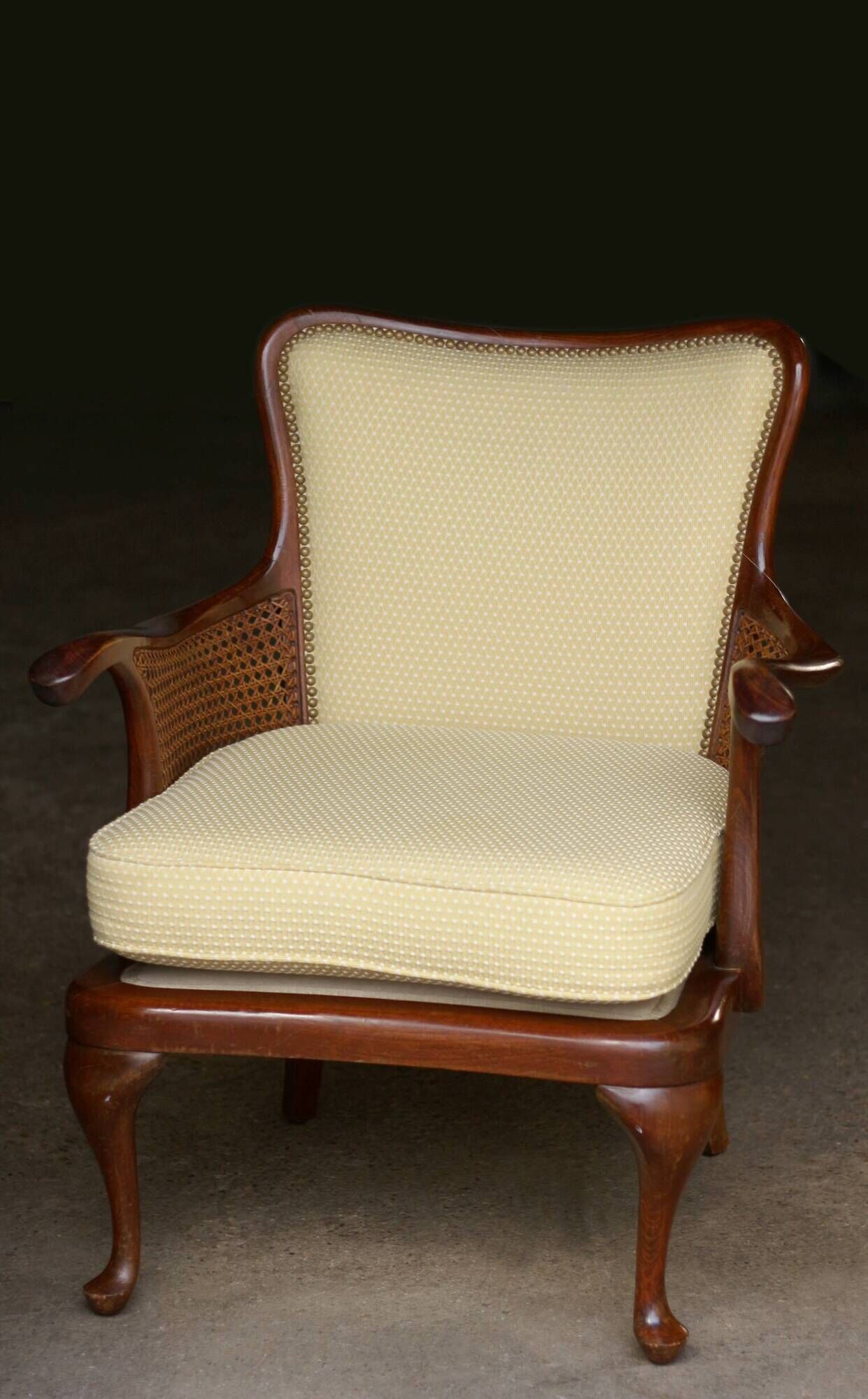 pair of mahogany and cane armchairs. English work (1960s).