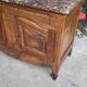 Very Louis XV from the 18th century in walnut with a marble top.