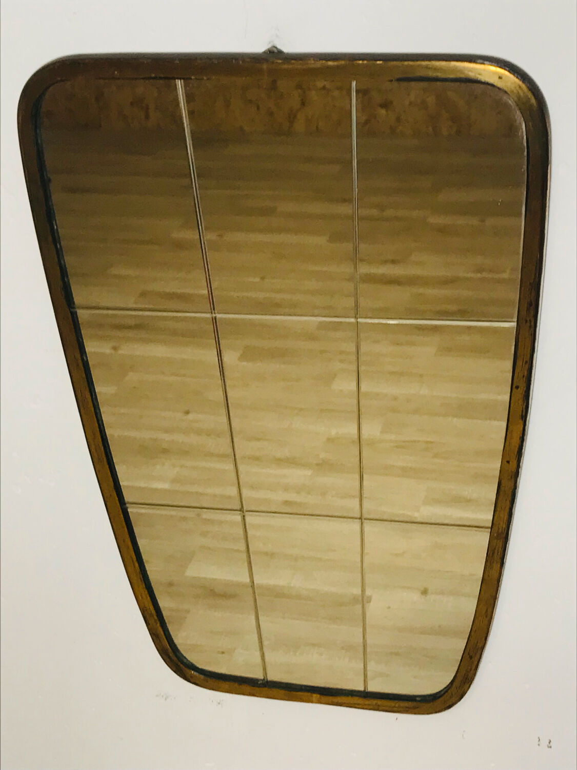 Asymmetrical mirror from the 60s