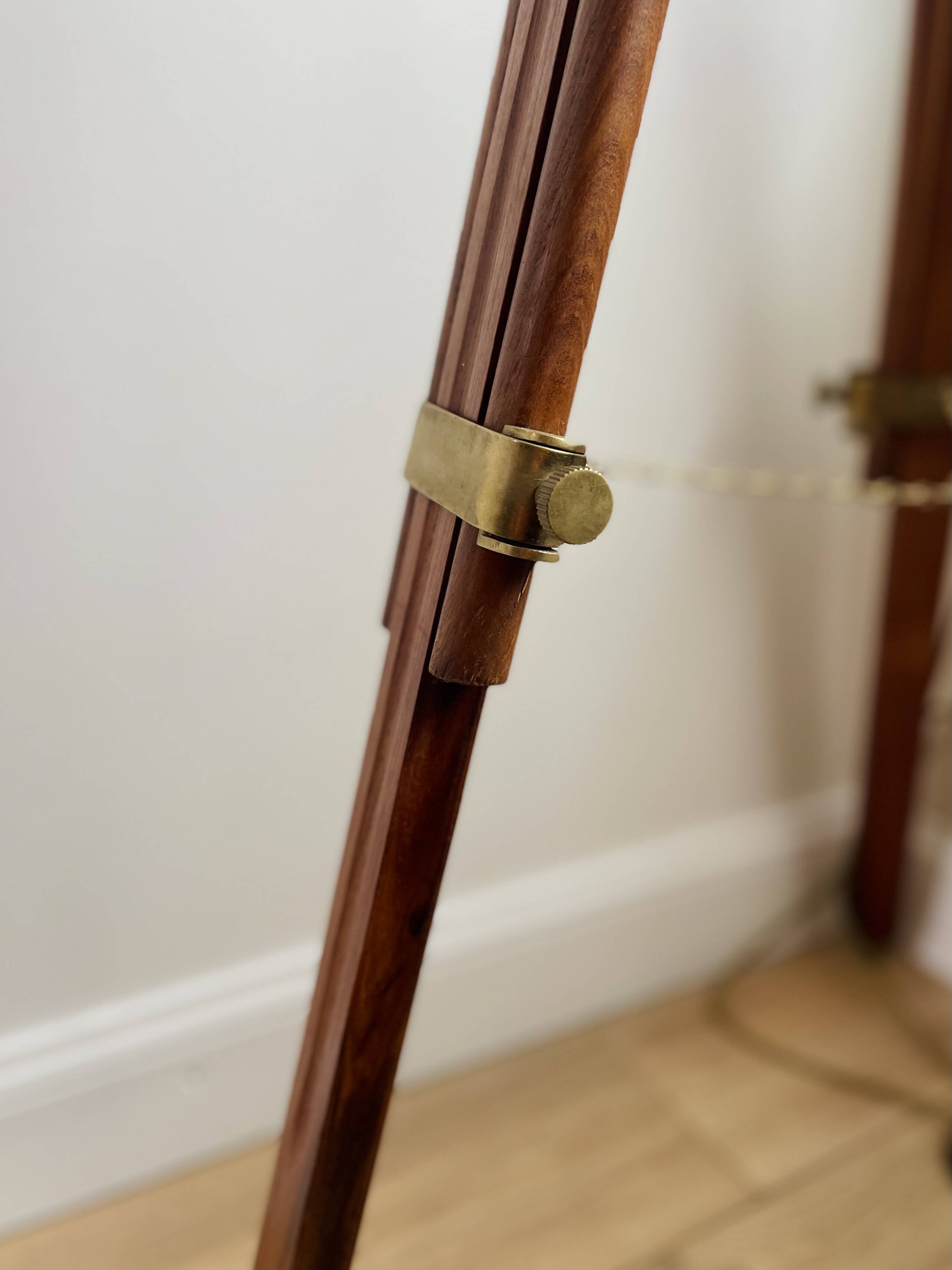 Vintage wooden and brass tripod lamp in marine style.
