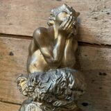 2 Seated satyr sculptures in cast bronze