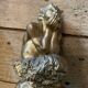 2 Seated satyr sculptures in cast bronze