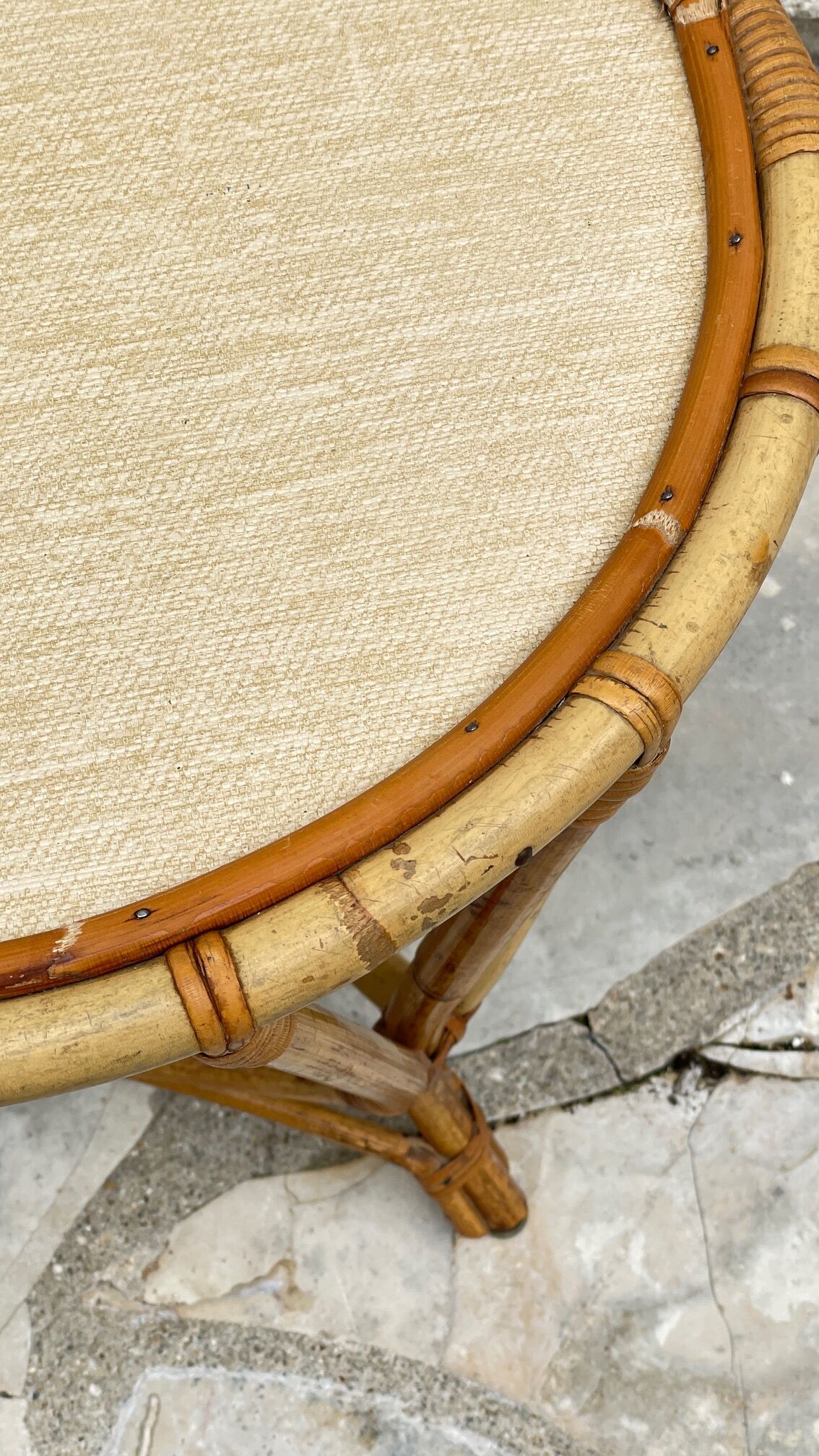 Round coffee table in vintage rattan