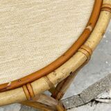 Round coffee table in vintage rattan