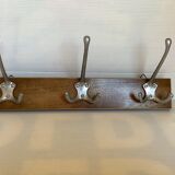 Old coat rack wood metal three hooks