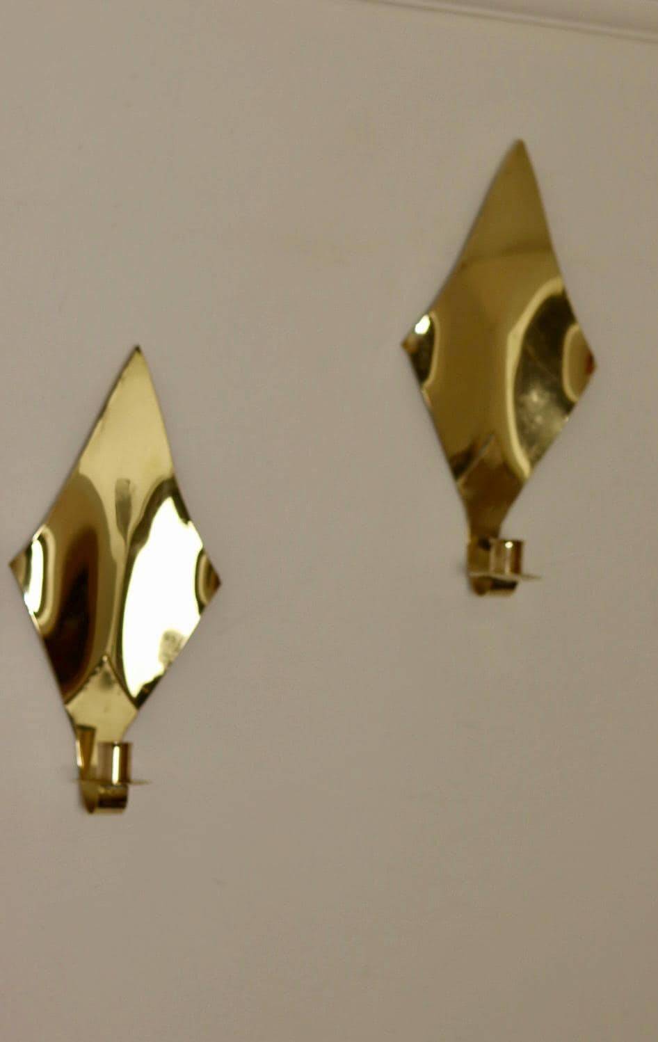 Pair of Swedish brass wall sconces from the mid-century.