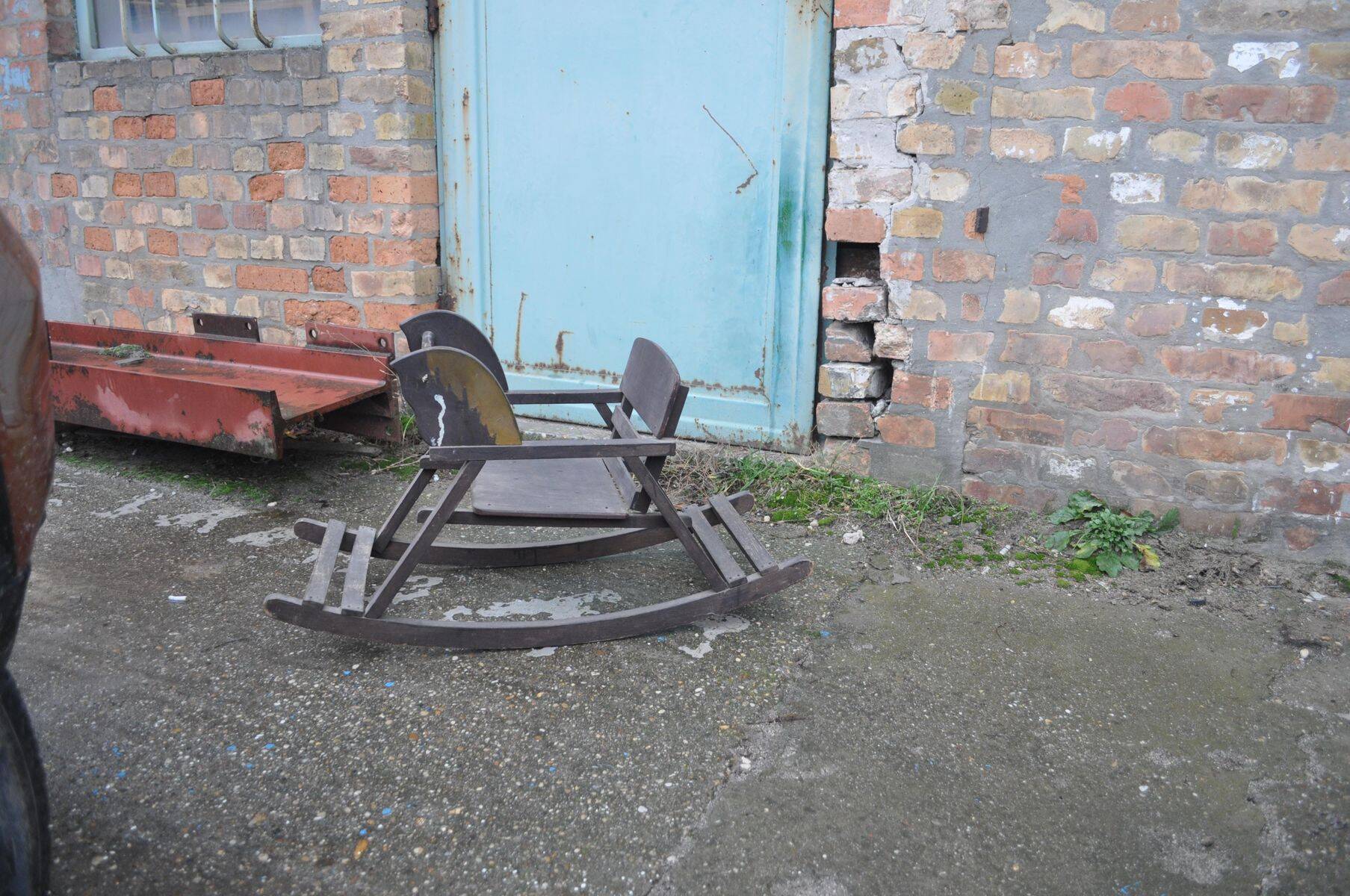 Vintage wooden rocking horse in painted brown — 1950s, Czech Republic