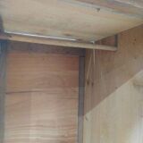 Vintage wooden wardrobe with matte cast iron color hanging rail