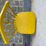Mustard yellow Baumann chair