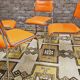 Set de 4 chaises chromées skaï orange 1970 vintage
