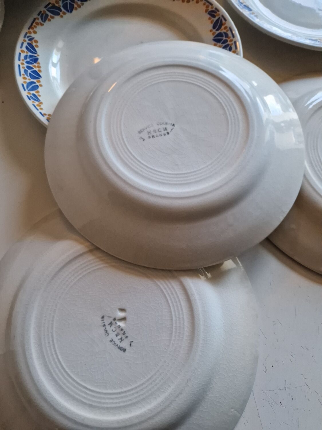 Set of 12 antique Art Deco plates, earthenware from Creil Montereau.