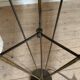 Vintage reed floor lamp in black metal and brass with three white opalines