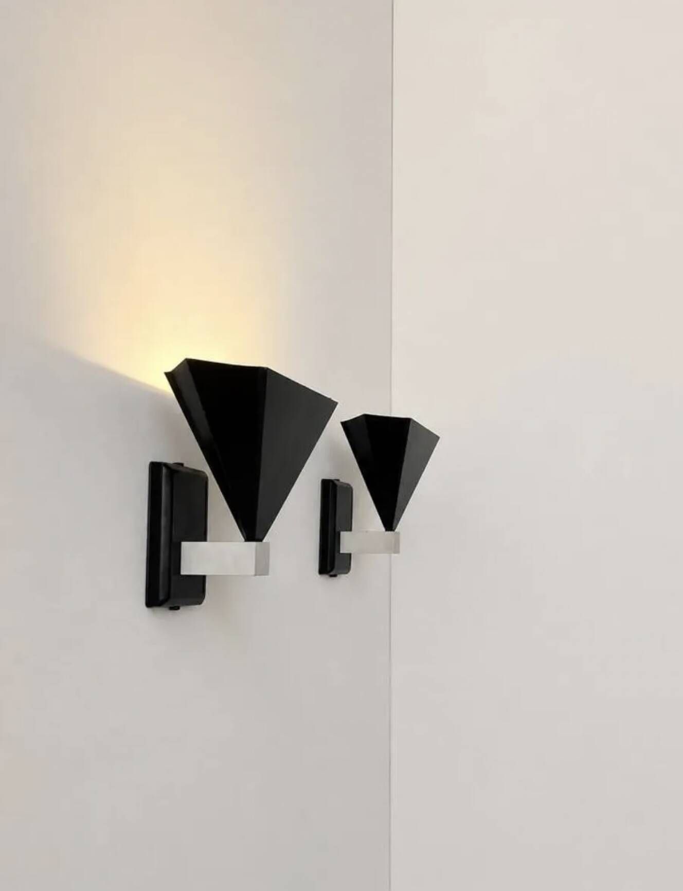 Pair of vintage wall sconces, matte black metal, Italy 1980.