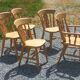 Set of 4 chairs and 1 armchair in mountain style.