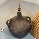 Large amphora floor lamp in pottery with a rattan shade from the 1960s.