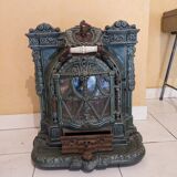 Mobile cast iron stove model "la chatte" designed by the French engineer Edmond Chaboche in 1883