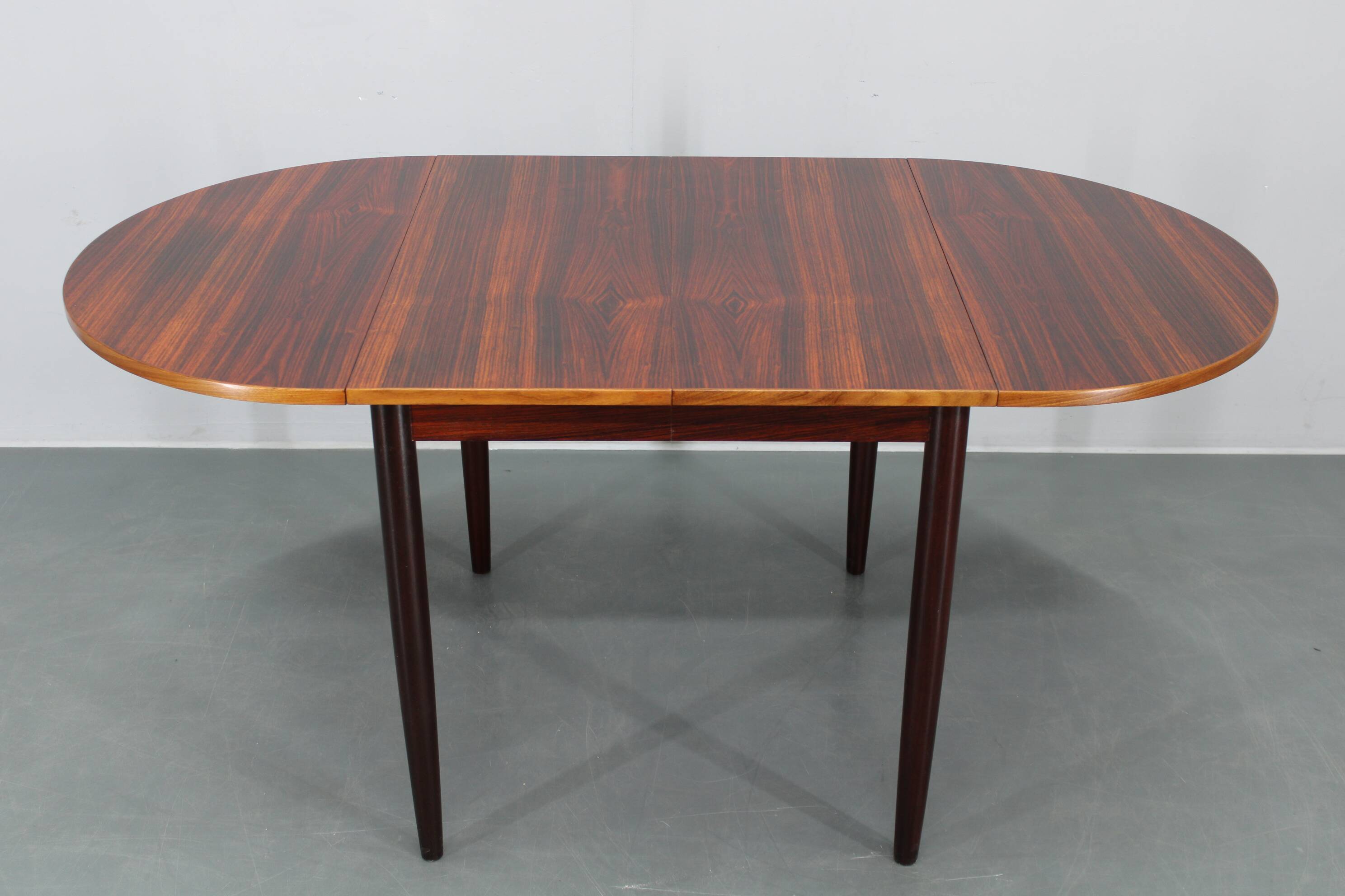 1960s Danish extendable palisander dining table, 4 leaves, restored