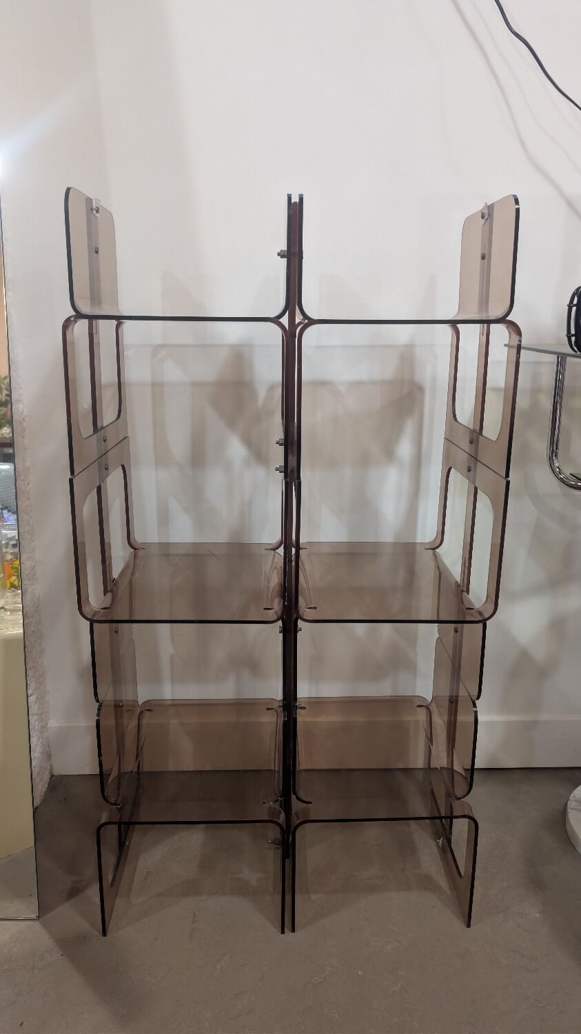 Smoked plexiglass bookshelf