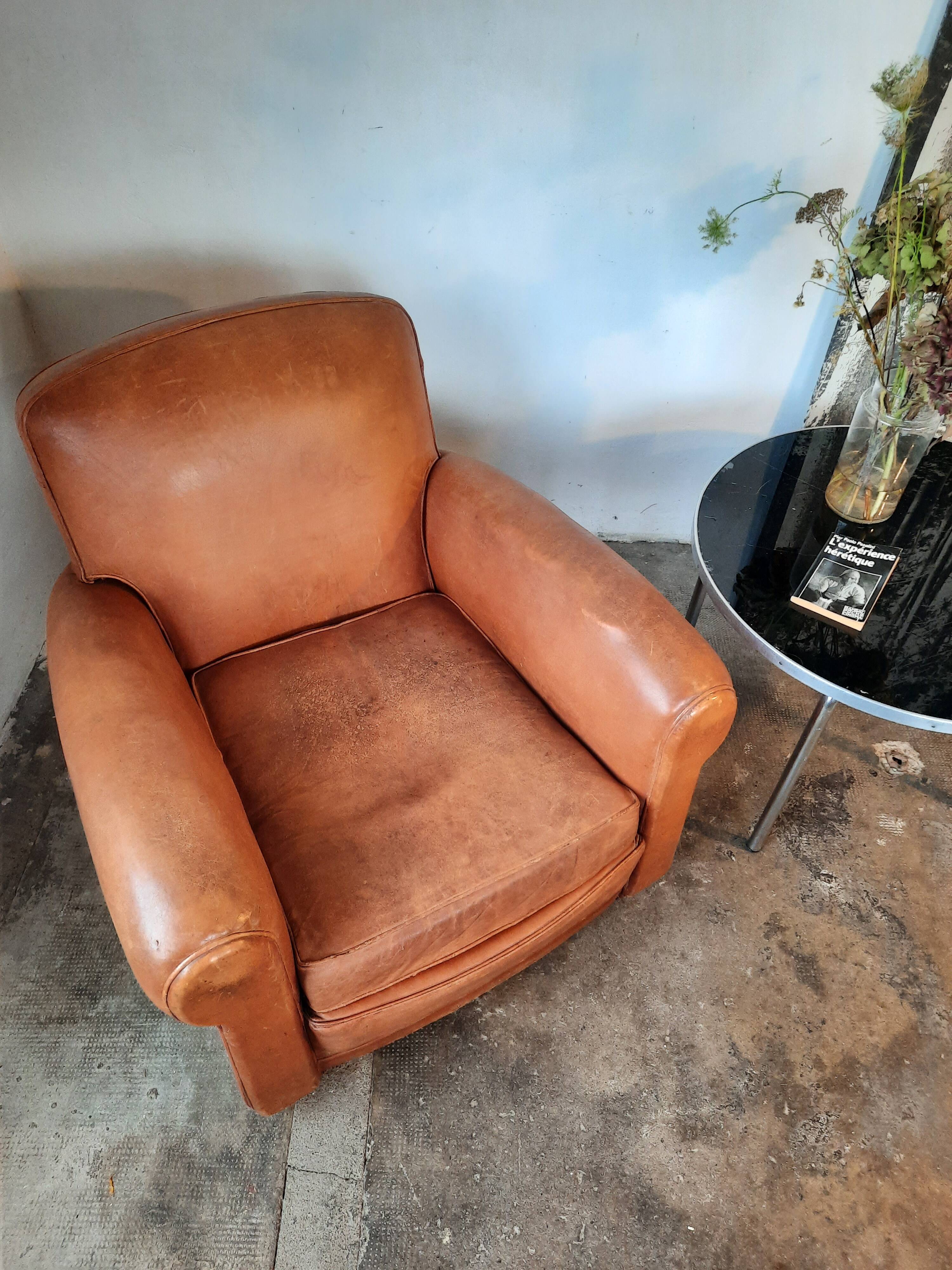 Old leather club chair 1940-1950