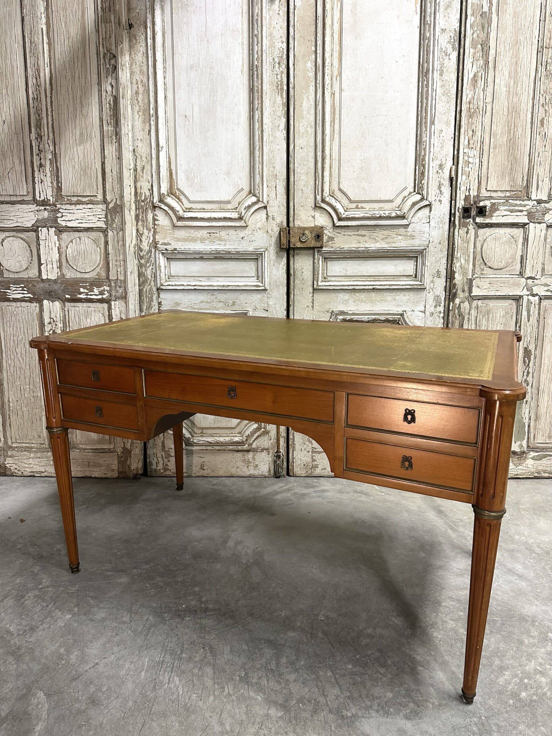 Louis XVI style flat desk in cherry wood from around 1960.