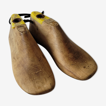 Pair of old wooden shoe shapes
