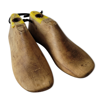 Pair of old wooden shoe shapes