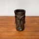 Abstract vase with a brutalist bronze face from the mid-century.