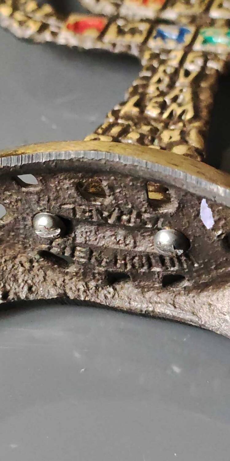 Menorah/Candlestick with 7 light arms. In old gold patinated brass/Decor 12 astrological signs. Engraved Jerusalem. Height 14 cm