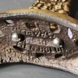 Menorah/Candlestick with 7 light arms. In old gold patinated brass/Decor 12 astrological signs. Engraved Jerusalem. Height 14 cm