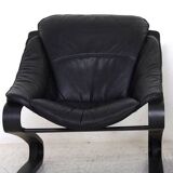 Paire de fauteuils en cuir noir, datant des années 70
