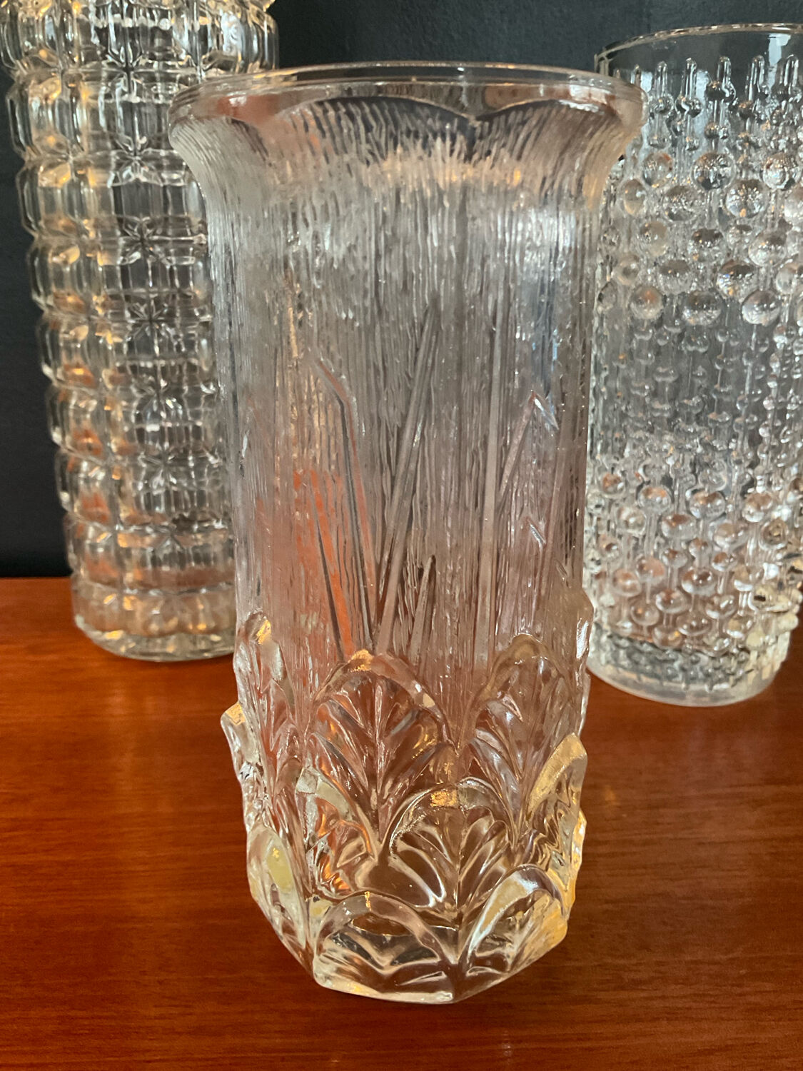 Vintage trio of moulded glass roll vases