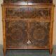 Queen Anne style pedestal commode from around 1710 in walnut and oyster veneer.